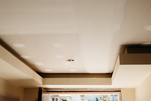 Unpainted bulkhead edge aligned above kitchen cabinet positions