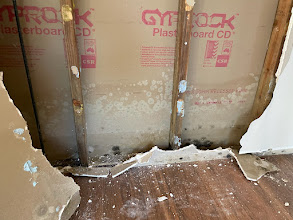 Plaster crack shown with the surrounding wall junction for context