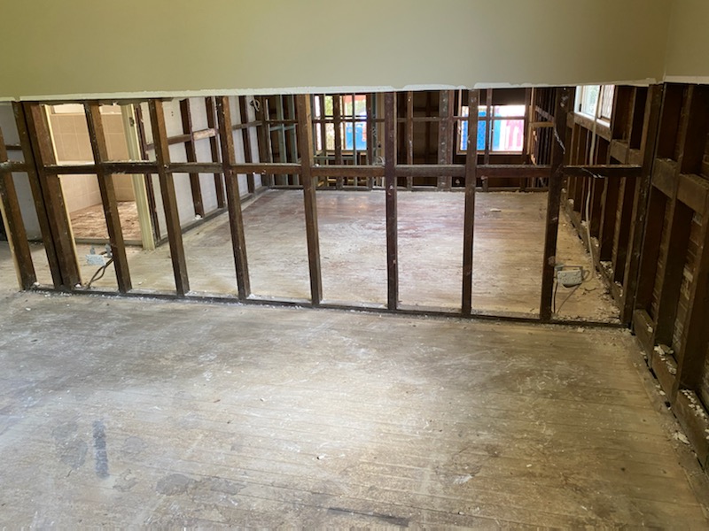 Wall lining and a service opening before finishing